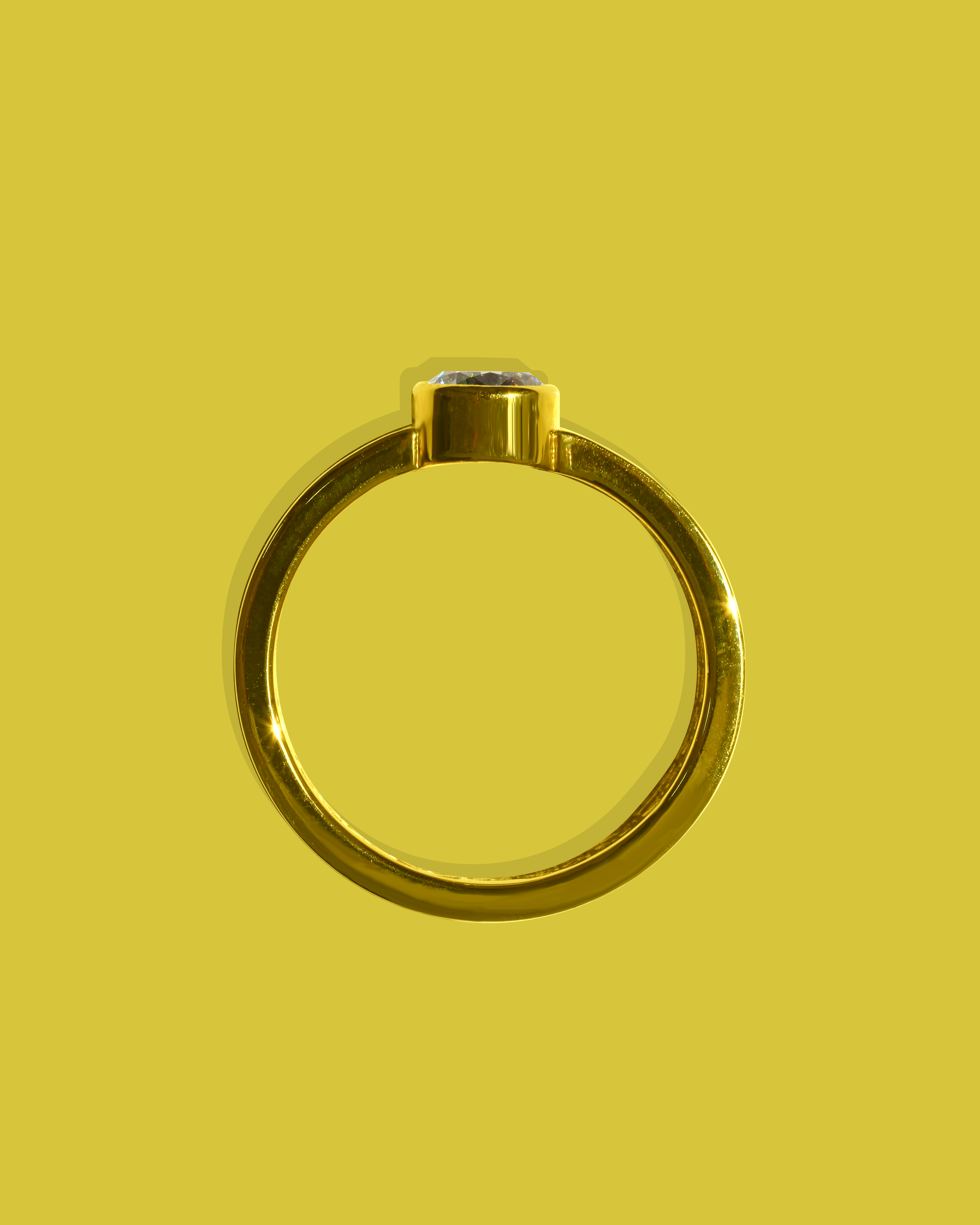 Round natural cut diamond Engagement Ring with a simple bezel setting, available in 18K or platinum, and in white, yellow, or rose gold options. Bespoke engagement ring from Melbourne jewellery.